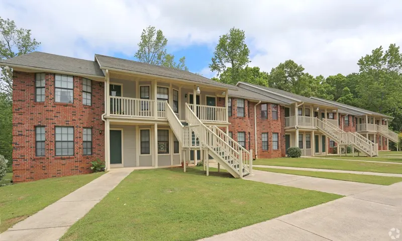 Two-story brick buildings with exterior stairways at Alpine Village